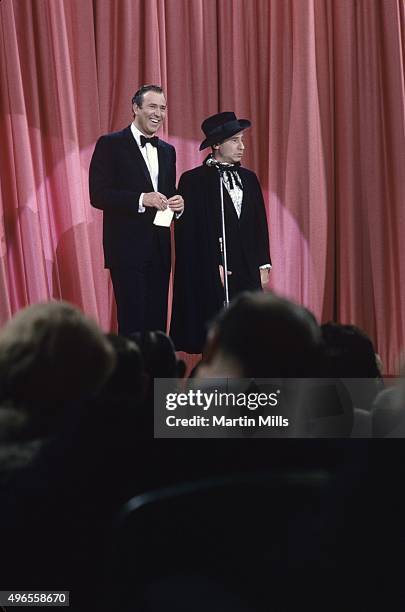 Comedians, writers and directors Carl Reiner and Mel Brooks perform their routine 'The 2000 Year Old Man' circa 1967 in Los Angeles, California.