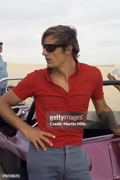 French World Cup alpine ski racer Jean-Claude Killy poses for a portrait with his dune buggy circa 1967 in Las Vegas, Nevada.