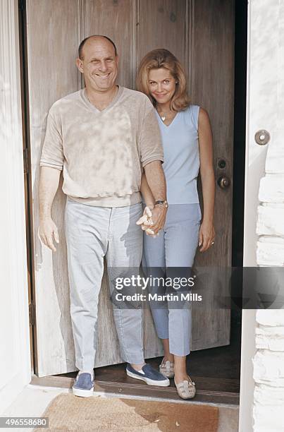 Actress Elizabeth Montgomery and her husband producer and director Bill Asher pose for a portrait at home in 1966 in Beverly Hills, California.
