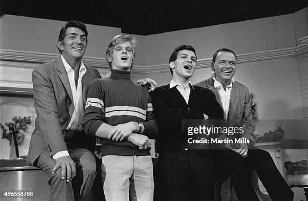 Entertainers Dean Martin and Frank Sinatra with with their sons, Dean Paul Martin and Frank Sinatra Jr. On the set of 'The Dean Martin Show'...