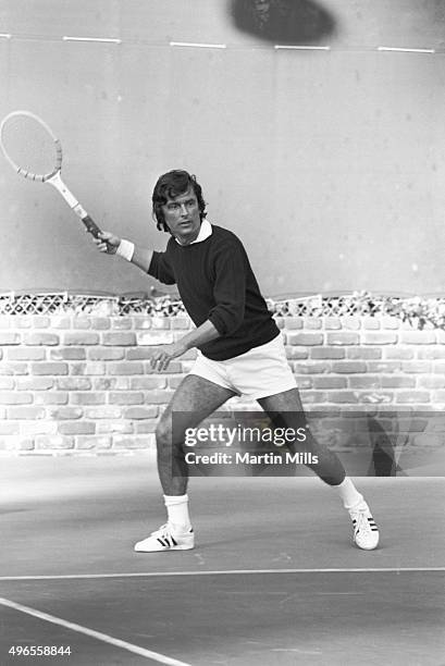 Film producer Robert Evans plays tennis circa 1970.