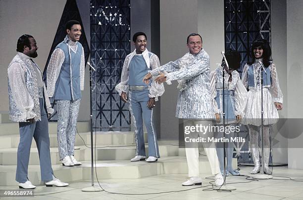 Singer and actor Frank Sinatra and The 5th Dimension perform on the television special 'Francis Albert Sinatra Does His Thing' on August 15 in Los...