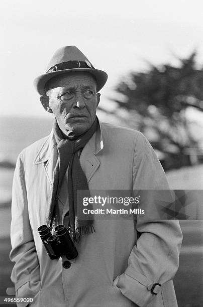 Entertainer Bing Crosby watches the action during the 30th Annual Bing Crosby National Pro-Am Golf Tournament and Clambake Weekend at Pebble Beach...