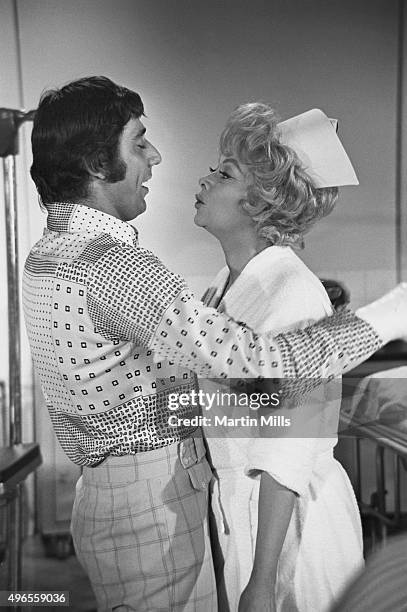 Football player Joe Namath of the New York Jets and American comedienne Lucille Ball in a sketch for 'The Super Comedy Bowl' on December 6, 1970 in...