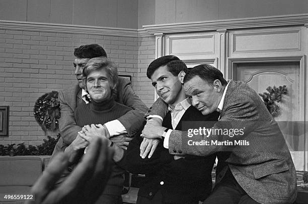 Entertainers Dean Martin and Frank Sinatra with with their sons, Dean Paul Martin and Frank Sinatra Jr. On the set of 'The Dean Martin Show'...