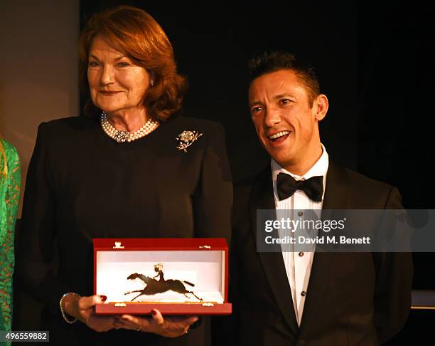 Antoinette Oppenheimer and Frankie Dettori celebrate "Golden Horn" winning Horse Of The Year at the 25th Cartier Racing Awards at The Dorchester on...