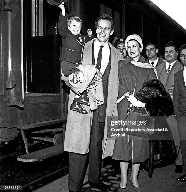 American actor Charlton Heston arriving at Termini railway station with his wife and American actress Lydia Clarke and his son Fraser Clarke Heston...