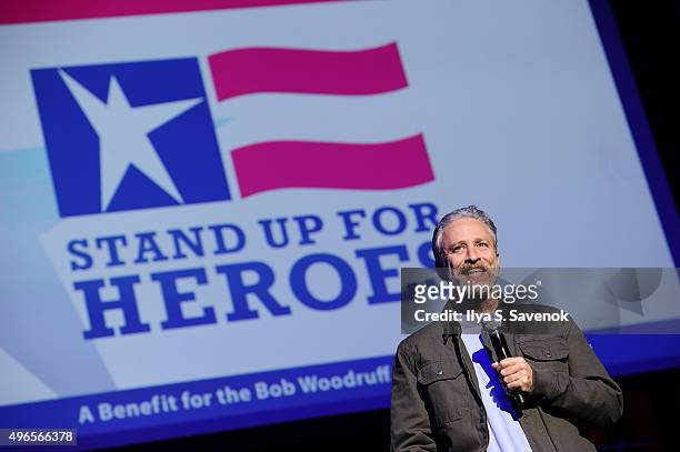 Comedian Jon Stewart performs on stage at the New York Comedy Festival and the Bob Woodruff Foundation's 9th Annual Stand Up For Heroes Event on...