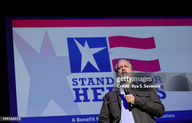 Comedian Jon Stewart performs on stage at the New York Comedy Festival and the Bob Woodruff Foundation's 9th Annual Stand Up For Heroes Event on...