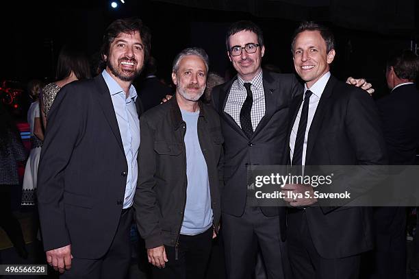 Comedians Ray Romano, Jon Stewart, John Oliver, and Seth Meyers pose backstage at the New York Comedy Festival and the Bob Woodruff Foundation's 9th...