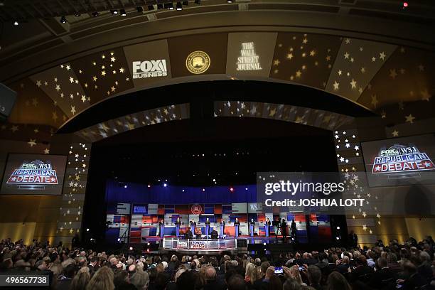 Republican presidential candidates John Kasich, Jeb Bush, Marco Rubio, Donald Trump, Ben Carson, Ted Cruz, Carly Fiorina and Rand Paul stand on stage...