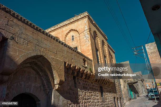 traditional houses at narrow street of middleeastern town mardin turkey - touristical stock pictures, royalty-free photos & images