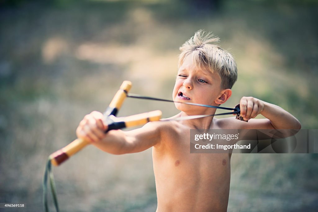 Funny Little Boy Drawing A Slingshot High-Res Stock Photo - Getty Images Funny Little Boy Drawing A Slingshot High-Res Stock Photo - Getty Images