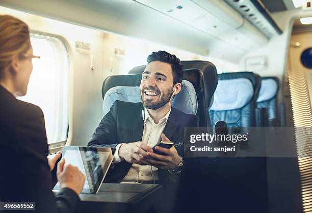 business meeting on the train - portability stock pictures, royalty-free photos & images