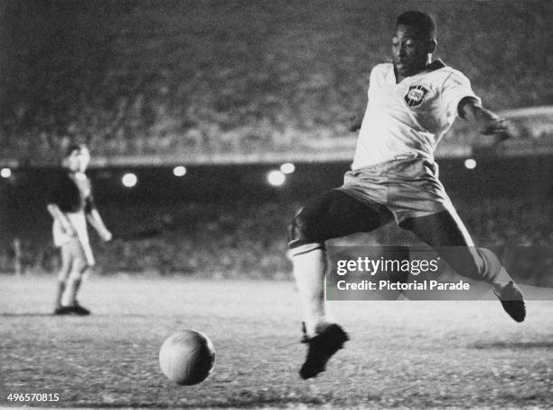 Brazilian footballer Pele playing for Brazil, circa 1958.