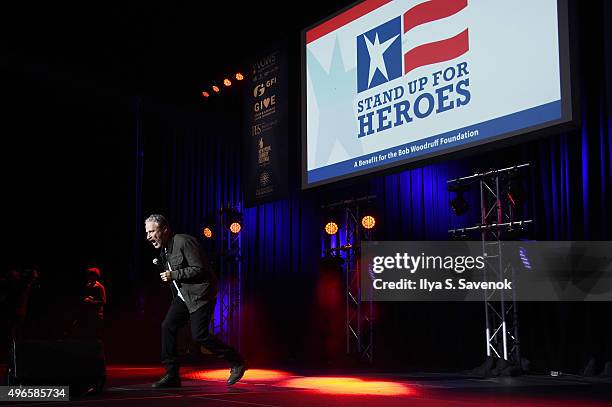 Comedian Jon Stewart speaks on stage at the New York Comedy Festival and the Bob Woodruff Foundation's 9th Annual Stand Up For Heroes Event on...