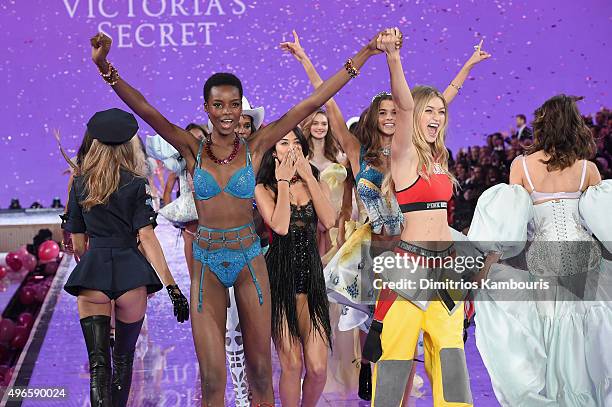 Models including Maria Borges from Angola, Shanina Shaik from Australia, and Gigi Hadid from California walk the runway during the 2015 Victoria's...