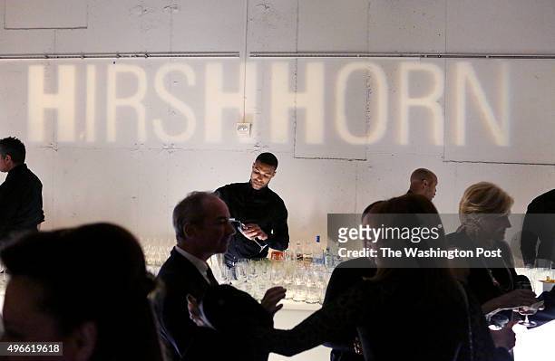 Guests mingle by the bar at the Hirshhorn Museum's 40th anniversary gala, held at 4 World Trade Center in Manhattan, NY, on November 09 instead of...