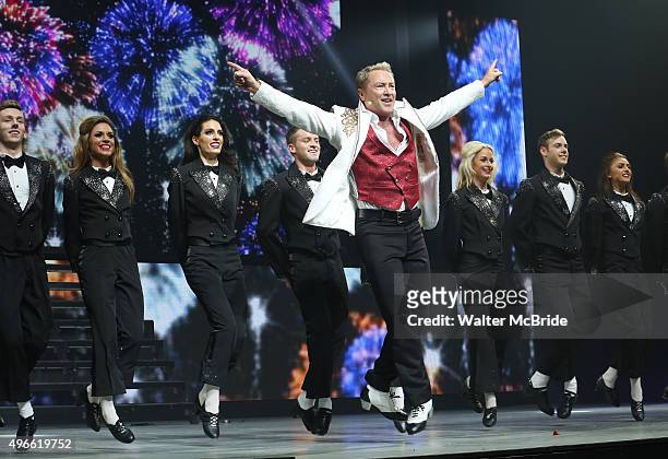 Michael Flatley with the cast onstage during the curtain call for the Broadway Opening and debut of 'Lord of the Dance: Dangerous Games' at The Lyric...