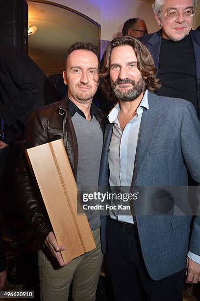 Prix de Flore 2015 winner Jean-Noel Orengo and Frederic Beigbeder attend the "Prix De Flore 2015 : " Literary Prize Winner Announcement at Cafe de...