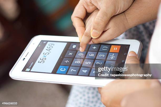 Touch Screen Calculator Photos and Premium High Res Pictures - Getty Images