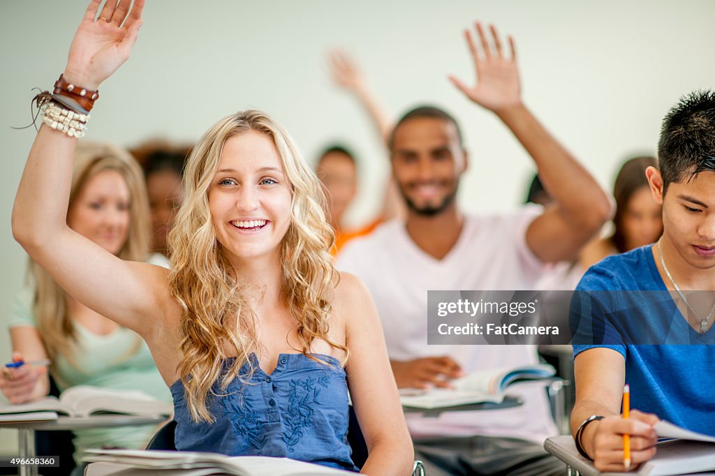 College Students Answering Questions in Class