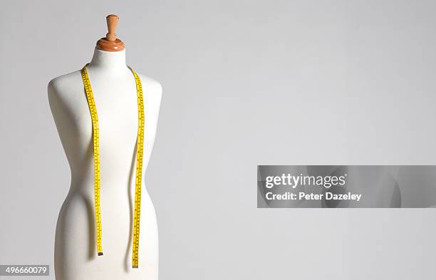 dressmaker's mannequin - measuring tape foto e immagini stock