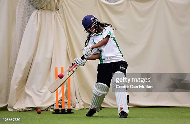 Girl from Carlton Bolling school practices her batting in the nets during the ECB announcement at Lord's Cricket Ground on November 11, 2015 in...
