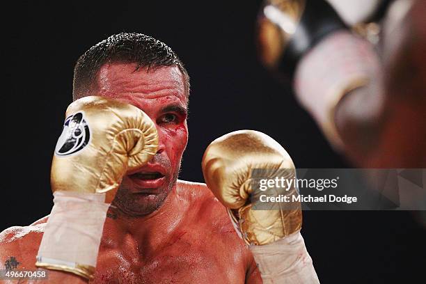 Bloodied Anthony Mundine of Australia looks on in his bout against Charles Hatley of the USA at The Melbourne Convention and Exhibition Centre on...