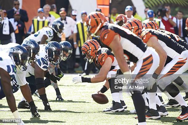Cincinnati Bengals Russell Bodine and offensive line lined up at line of scrimmage vs Seattle Seahawks Brandon Mebane and defensive line at Paul...