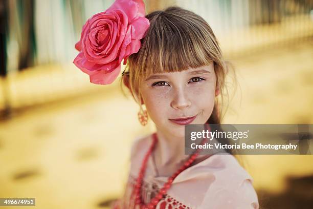 girl in flamenco style dress at the sevilla - seville dancing stock pictures, royalty-free photos & images