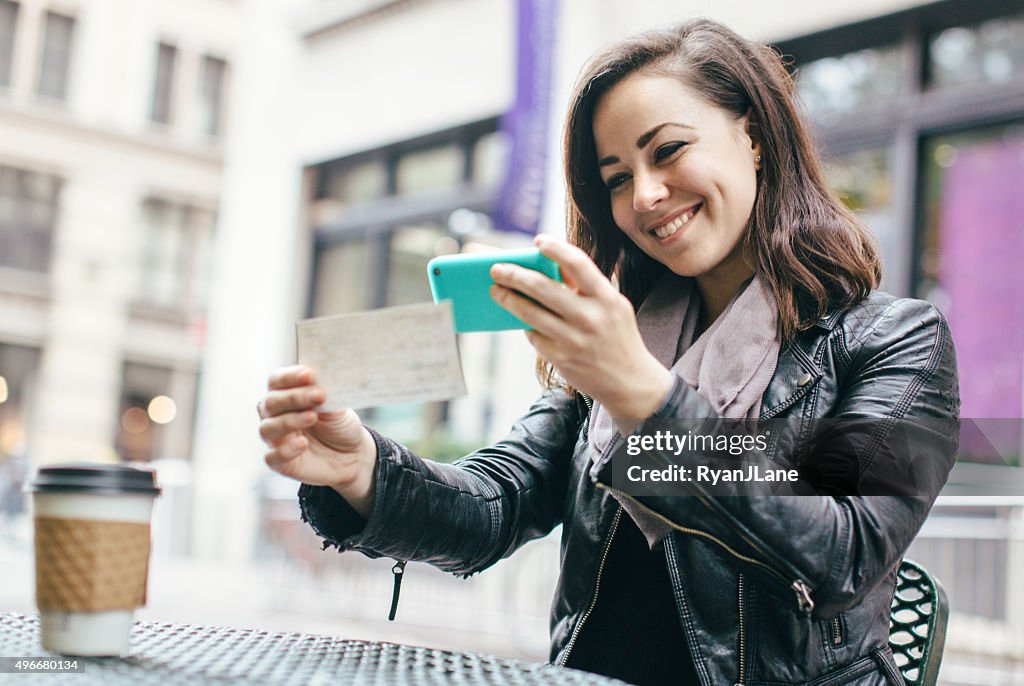 New York Woman Depositing Check Remotely