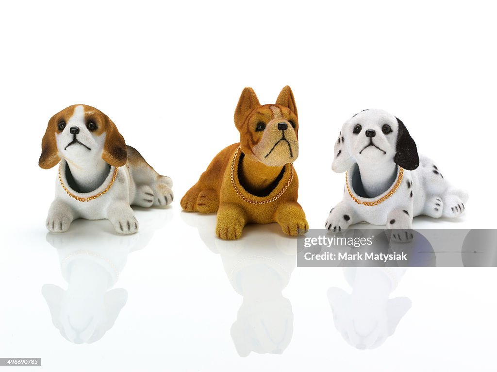 Three retro car nodding dogs