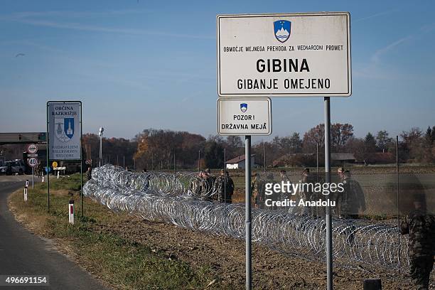 Members of the Slovenia Defence Force install fences on the Slovenian-Croatian border to prevent refugees to enter Europe in Brezice, Slovenia on...