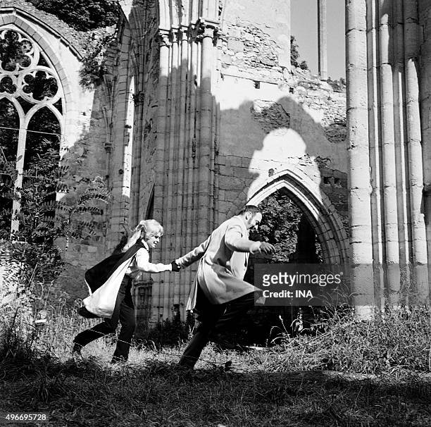 Outdoor in a neglected church, a scene of the serial "Rocambole: the beautiful gardener" with Marianne Girard and Julien Guiomar.