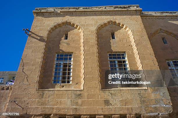 old traditional stone house windows at middleeastern town mardin turkey - touristical stock pictures, royalty-free photos & images