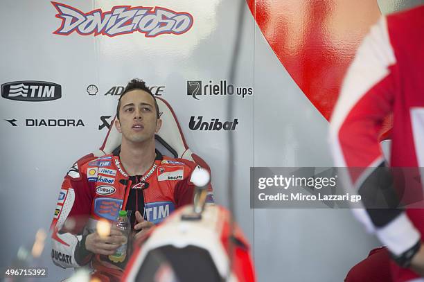 Andrea Dovizioso of Italy and Ducati Team looks on in the pit during the second day of test during the MotoGp Tests In Valencia at Ricardo Tormo...