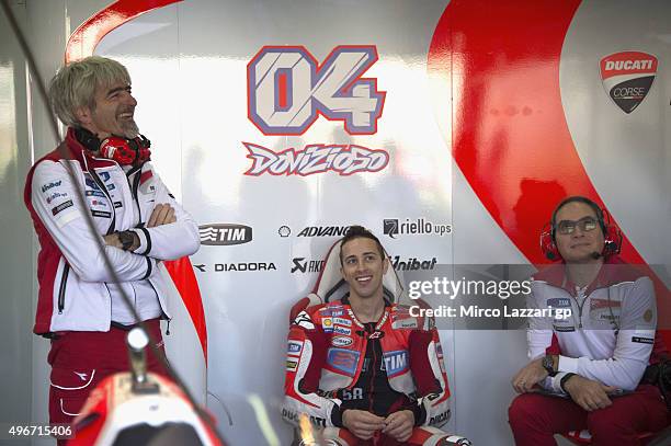 Andrea Dovizioso of Italy and Ducati Team smiles in the pit during the second day of test during the MotoGp Tests In Valencia at Ricardo Tormo...