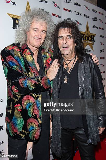 Brian May and Alice Cooper attend the Classic Rock Roll of Honour at The Roundhouse on November 11, 2015 in London, England.