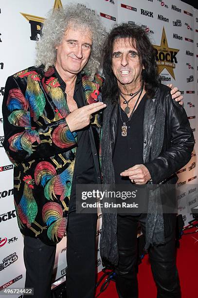 Brian May and Alice Cooper attend the Classic Rock Roll of Honour at The Roundhouse on November 11, 2015 in London, England.