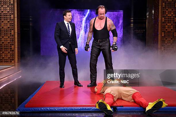 Episode 0365 -- Pictured: Host Jimmy Fallon and The Undertaker during the "Suggestion Box" bit on November 11, 2015 --