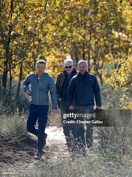 Eddie Bauer Philanthropic Ambassador Ryan Reynolds, American Forests President and CEO Scott Steen and Eddie Bauer President and CEO Mike Egeck plant...