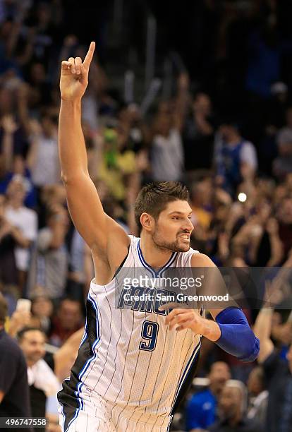 Nikola Vucevic of the Orlando Magic celebrates a game winning shot to defeat the Los Angeles Lakers 101-99 at Amway Center on November 11, 2015 in...