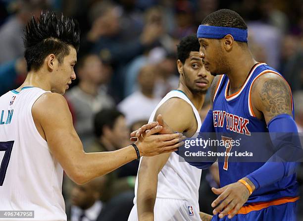 Former teammates Jeremy Lin of the Charlotte Hornets and Carmelo Anthony of the New York Knicks shake hands after the Hornets defeated the Knicks...