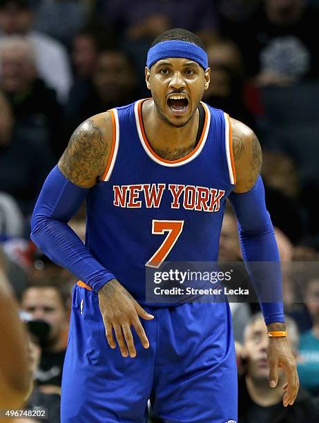 Carmelo Anthony of the New York Knicks reacts against the Charlotte Hornets during their game at Time Warner Cable Arena on November 11, 2015 in...