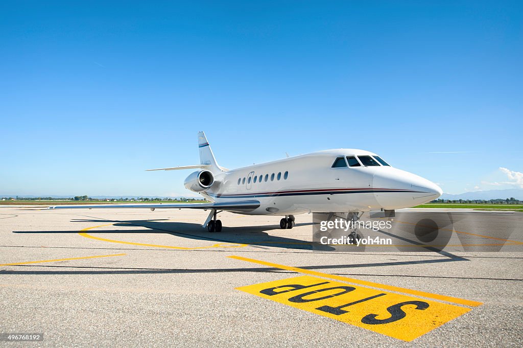 Private airplane on runway