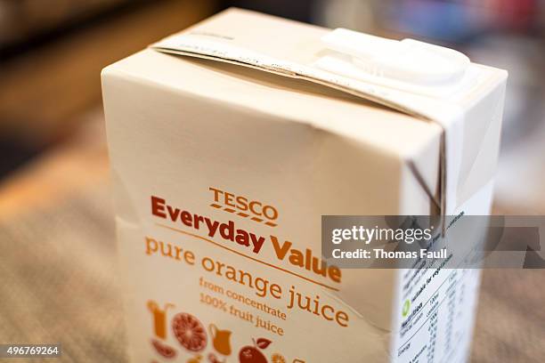 tesco everyday value orange juice - juice box stock pictures, royalty-free photos & images