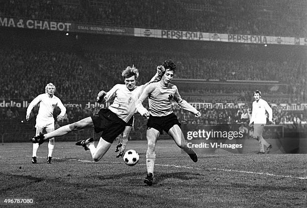 Per Haftorsen of Norway , Johan Cruijff of the Netherlands during the world cup qualifier match between the Netherlands and Norway on november 1,...