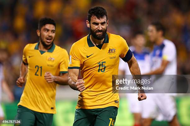 Mile Jedinak of the Socceroos celebrates scoring a goal from a penalty kick during the 2018 FIFA World Cup Qualification match between the Australian...