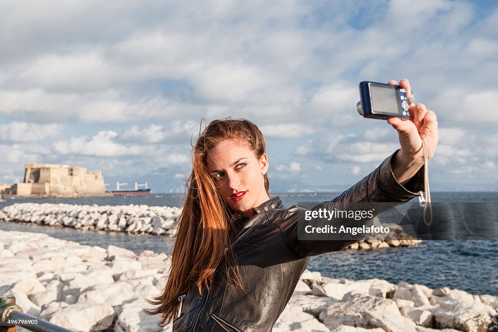 Happy Woman Traveler Taking Selfie